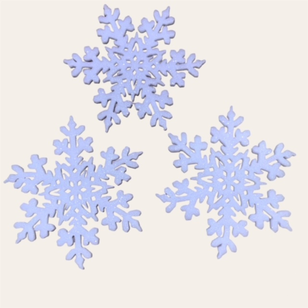 Tris fiocchi di neve fini