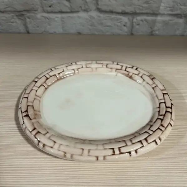 Piattino del portaburro gallina avorio